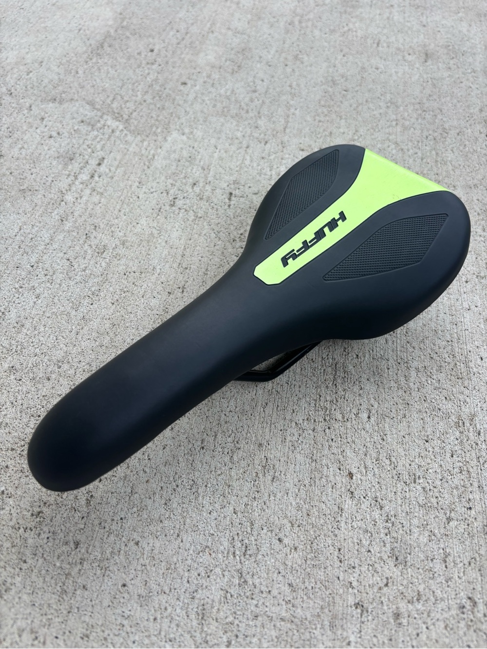 HUFFY Black Bicycle Saddle with Neon Green Accent